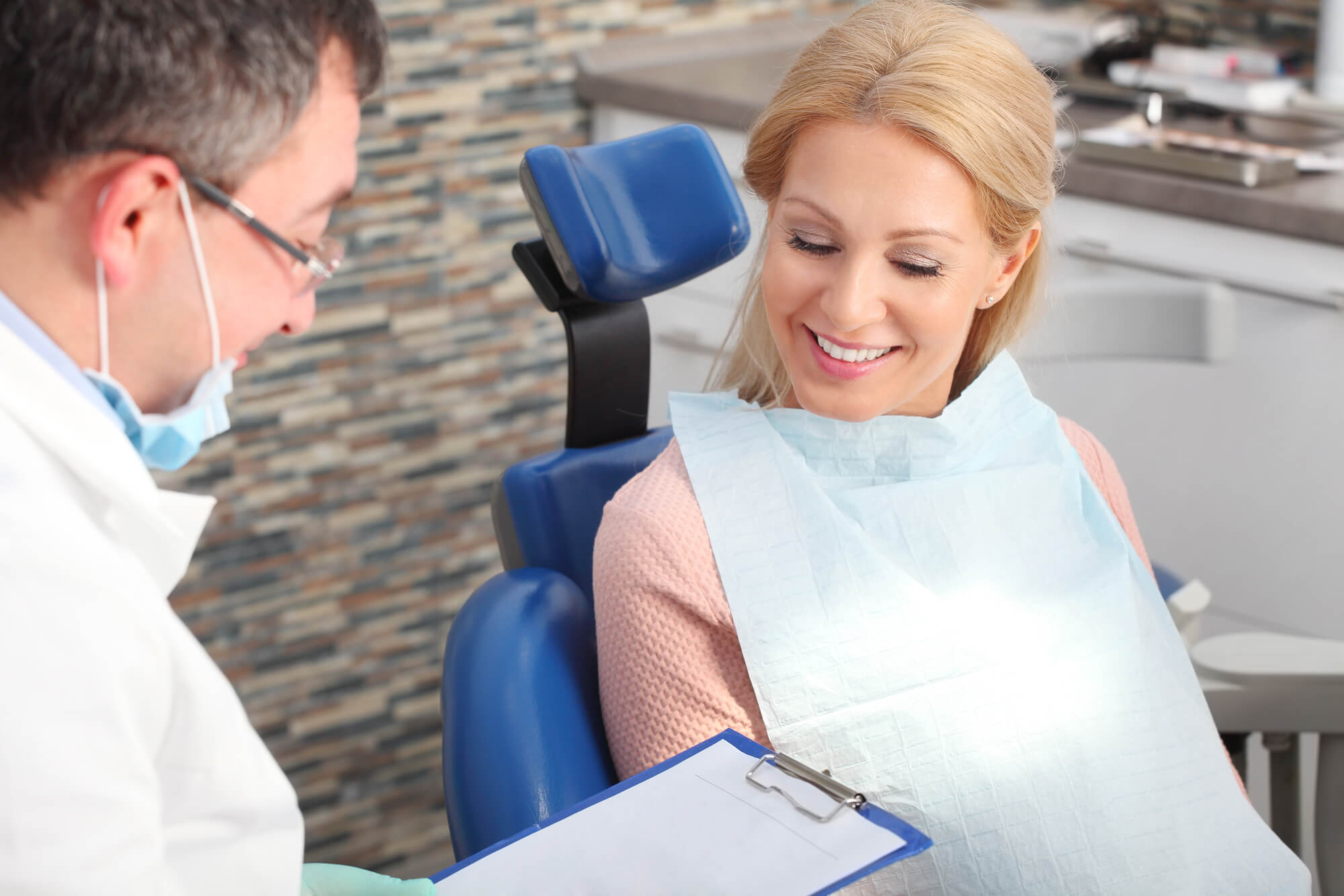 dentist and patient discussing financing options for dental implants walnut creek